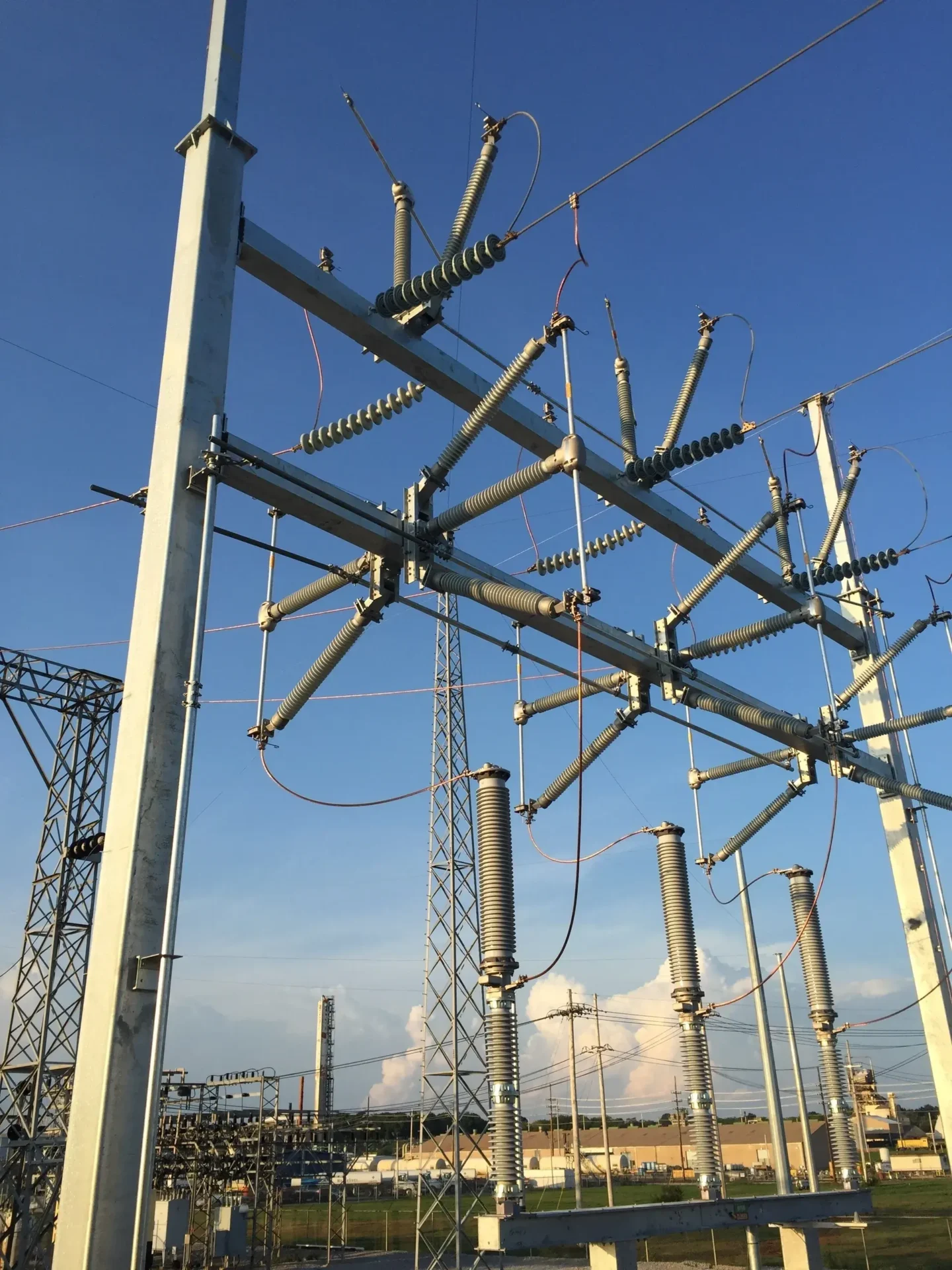 A group of power lines that are connected to poles.